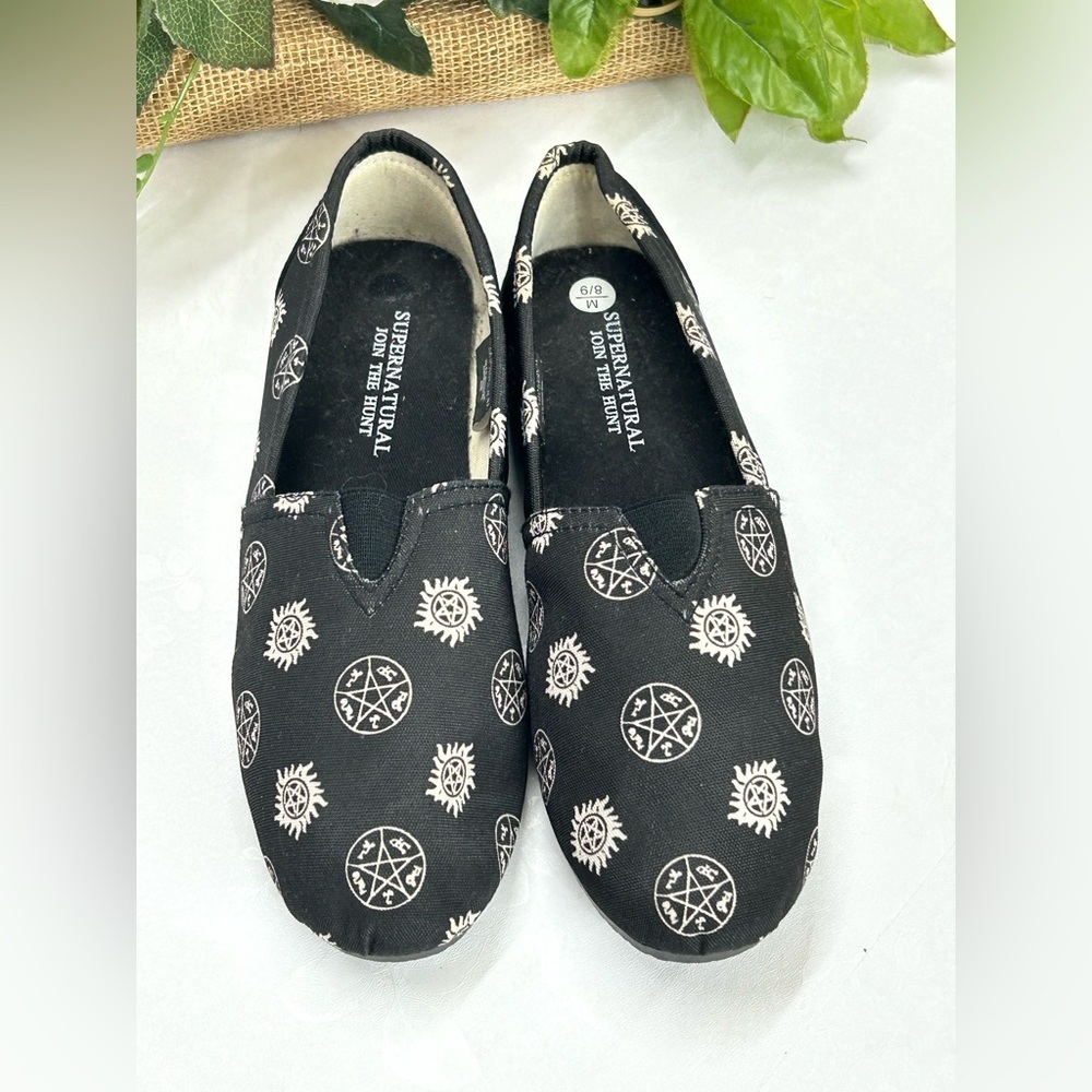 Black Slip-On Shoes with Supernatural Print